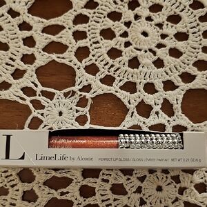 LimeLife by Alcone Shimmering Lip Gloss - Radiant Orange